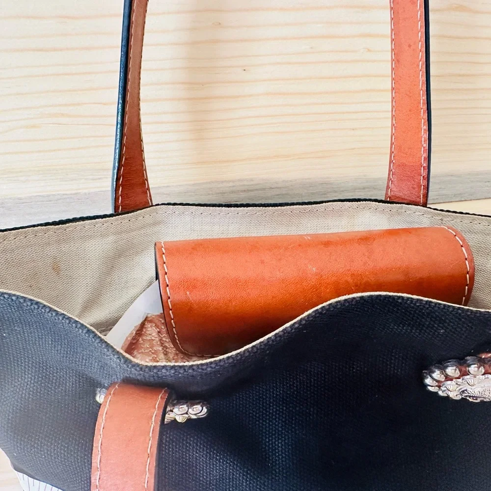 Black and brown western tote with leather acents